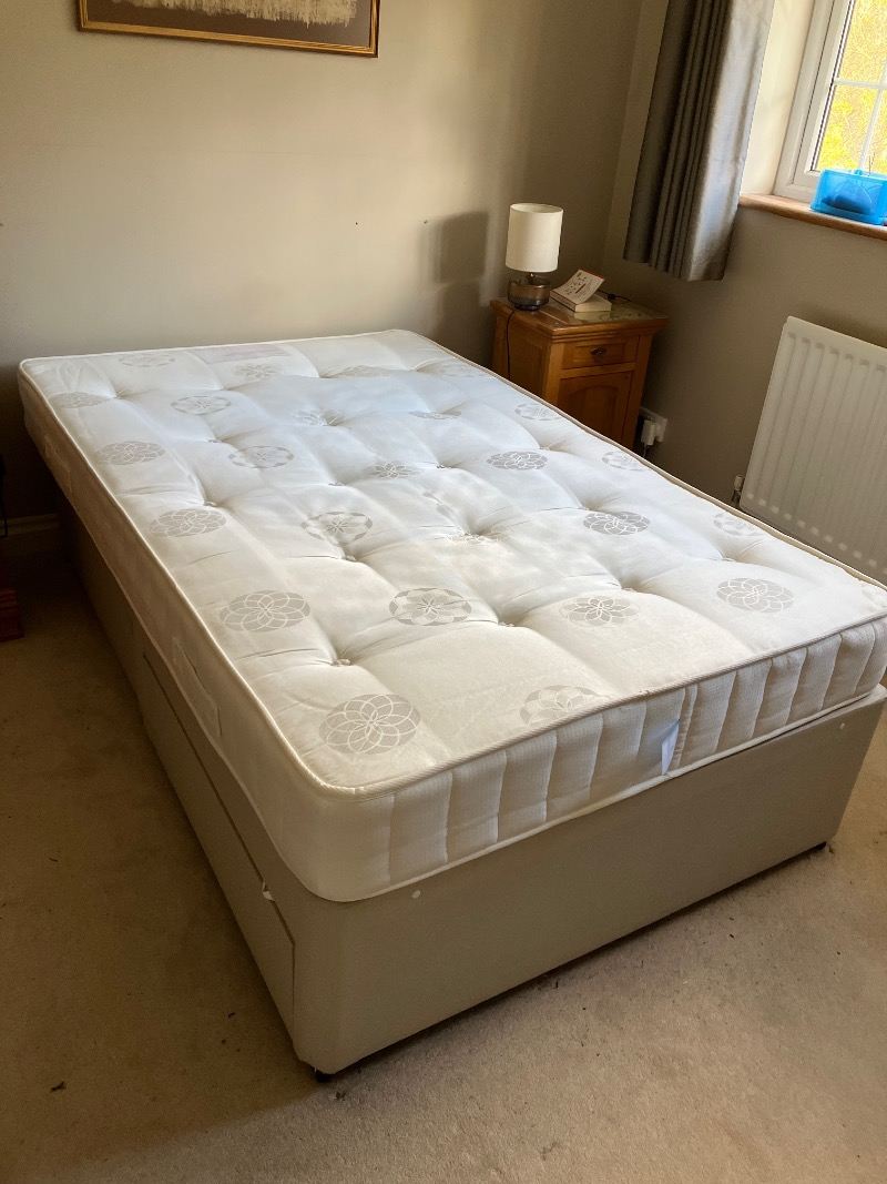 Bed No cash offers. Small double divan bed, firm mattress included. First side as new, some slight stains on other side see zoom in and full view when we flipped the bed. Not much used as in the spare room. collection only of the whole bed and mattress. that means full length but slightly narrower than a standard double.
 dimensions 120cm wide, 190cm l HP9 - removed for £0